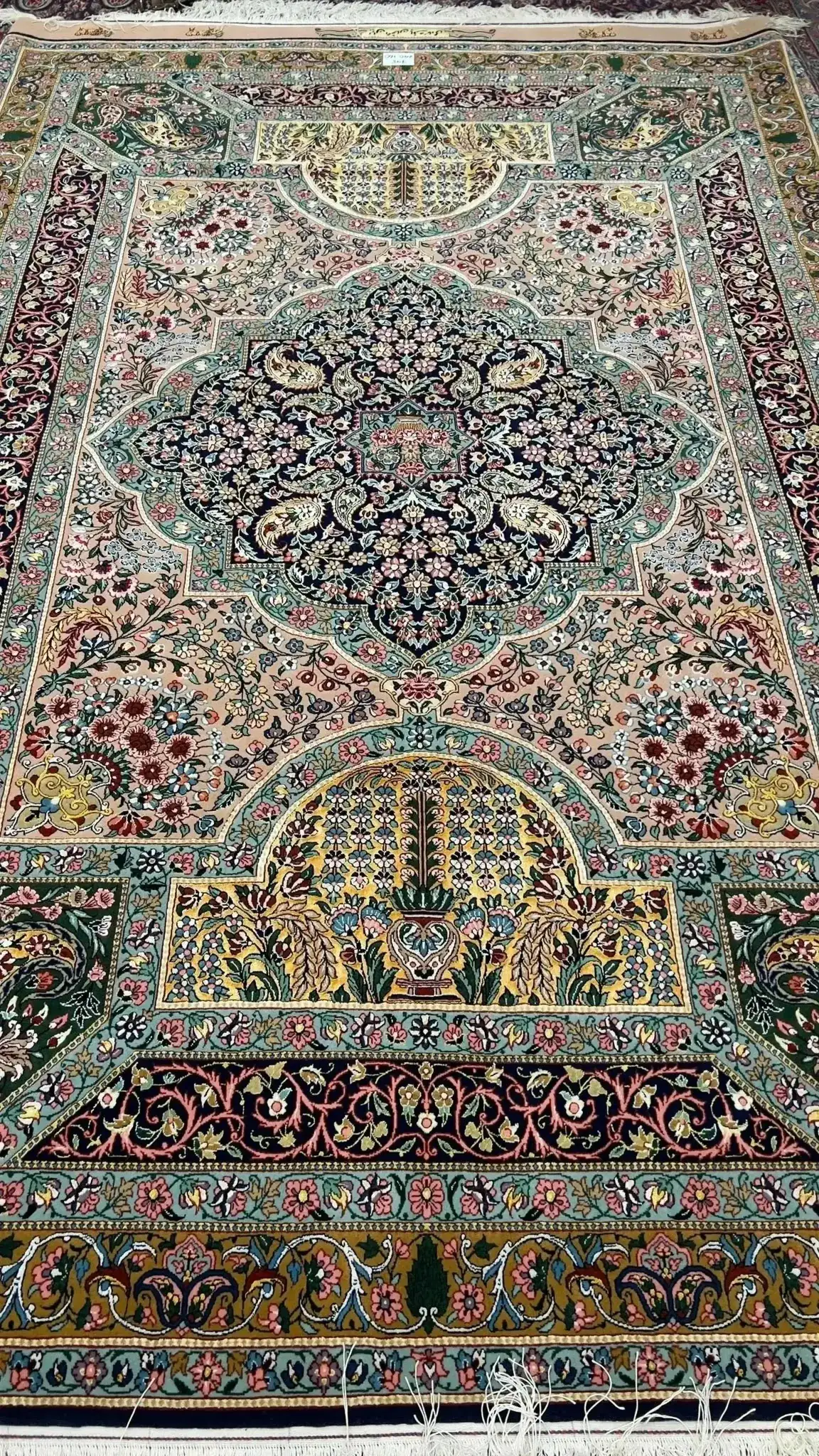 Floral Pattern Close-up on Samavie Rug – A close-up shot focusing on the beautiful floral motifs woven into the Samavie Persian rug, blending silk and wool for a soft and luxurious texture.